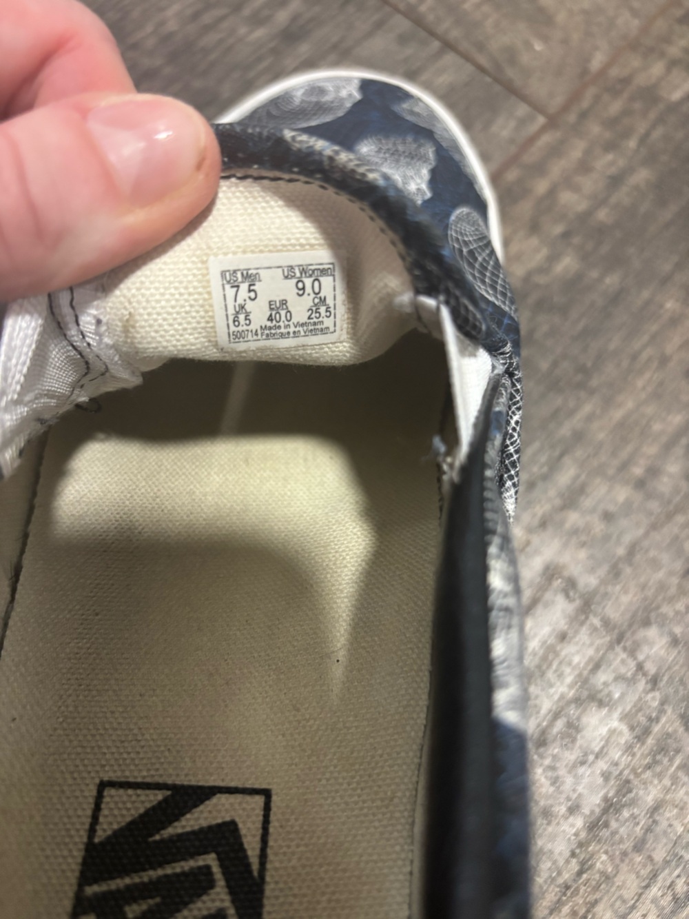 Vans Navy Slip-On Sneakers with White Wireframe Skull Pattern - Picture 5 of 5